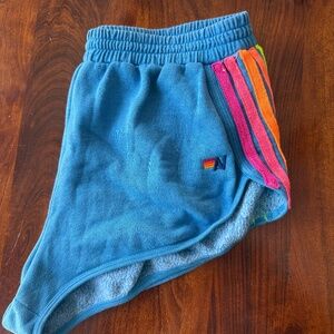 Aviator Nation Blue Shorts with Rainbow Stripes
